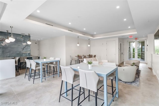 3000 Oasis Grand Blvd Unit 2103, Fort Myers, FL 33916 - dining space featuring a raised ceiling and recessed lighting