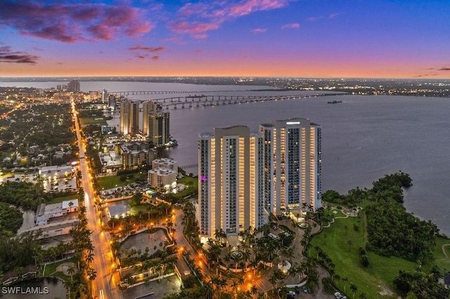3000 Oasis Grand Blvd Unit 2103, Fort Myers, FL 33916 - aerial view at dusk of a water view and a view of city