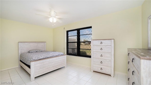 319 Reynolds Ct Unit M12, Naples, FL 34112 - bedroom featuring light tile patterned floors, baseboards, and ceiling fan
