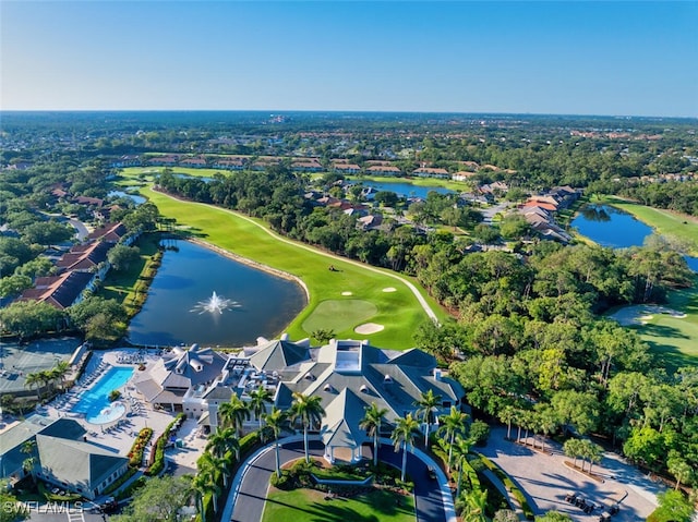 1630 Winding Oaks Way Unit 102, Naples, FL 34109 - view of property location featuring a nearby body of water, a golf club, and a tree filled landscape