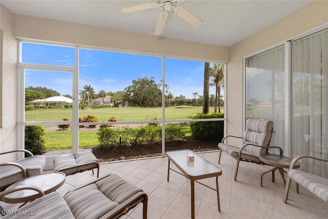 1630 Winding Oaks Way Unit 102, Naples, FL 34109 - sunroom featuring golf course view and a ceiling fan