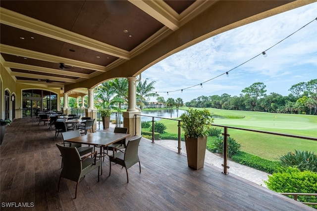 1630 Winding Oaks Way Unit 102, Naples, FL 34109 - view of patio / terrace with view of golf course, outdoor dining space, a water view, and ceiling fan