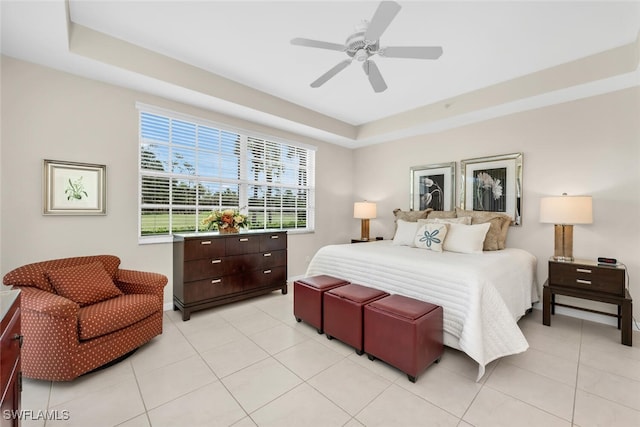 1630 Winding Oaks Way Unit 102, Naples, FL 34109 - bedroom featuring a raised ceiling, light tile patterned floors, and ceiling fan