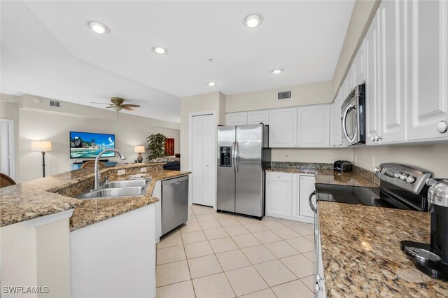 1630 Winding Oaks Way Unit 102, Naples, FL 34109 - kitchen featuring stainless steel appliances, a sink, white cabinetry, ceiling fan, and recessed lighting
