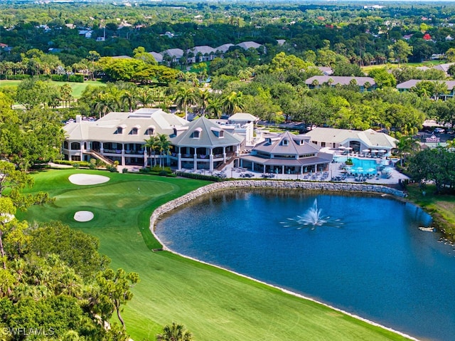 1630 Winding Oaks Way Unit 102, Naples, FL 34109 - drone / aerial view of a large body of water, a golf club, and a tree filled landscape