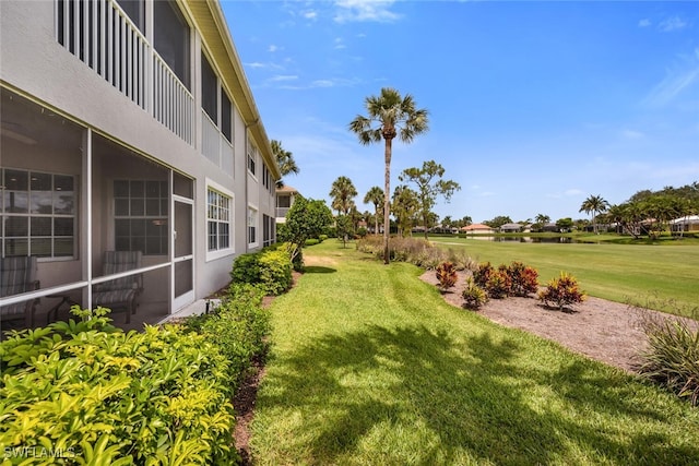 1630 Winding Oaks Way Unit 102, Naples, FL 34109 - view of grassy yard