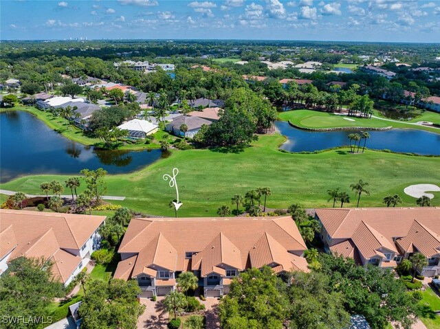 1630 Winding Oaks Way Unit 102, Naples, FL 34109 - aerial perspective of suburban area featuring a golf club and a large body of water