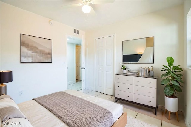 2938 Market St, Fort Myers, FL 33916 - bedroom featuring light tile patterned floors, a closet, and ceiling fan