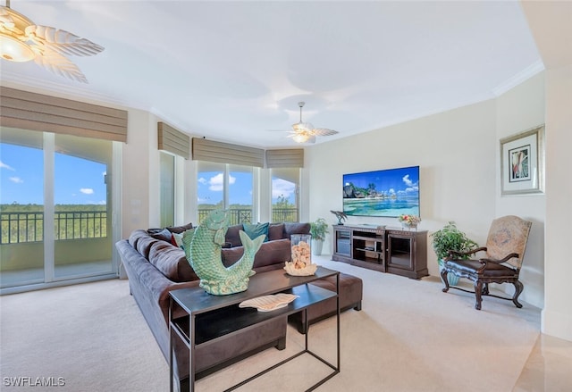 2738 Tiburon Blvd E Unit Ph-B502, Naples, FL 34109 - living area featuring carpet floors, plenty of natural light, ceiling fan, and crown molding