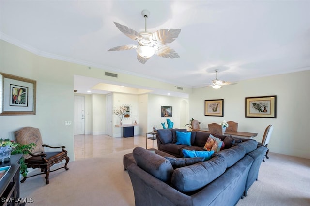 2738 Tiburon Blvd E Unit Ph-B502, Naples, FL 34109 - living area featuring ceiling fan, crown molding, and light colored carpet