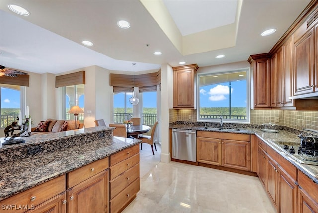 2738 Tiburon Blvd E Unit Ph-B502, Naples, FL 34109 - kitchen with stainless steel dishwasher, black electric cooktop, backsplash, a sink, and recessed lighting
