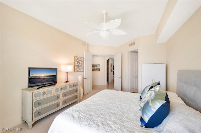 2738 Tiburon Blvd E Unit Ph-B502, Naples, FL 34109 - bedroom with arched walkways, ceiling fan, and a closet