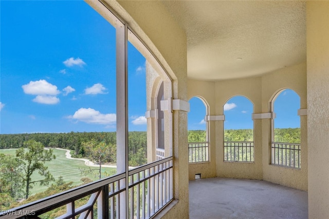 2738 Tiburon Blvd E Unit Ph-B502, Naples, FL 34109 - balcony featuring a view of trees