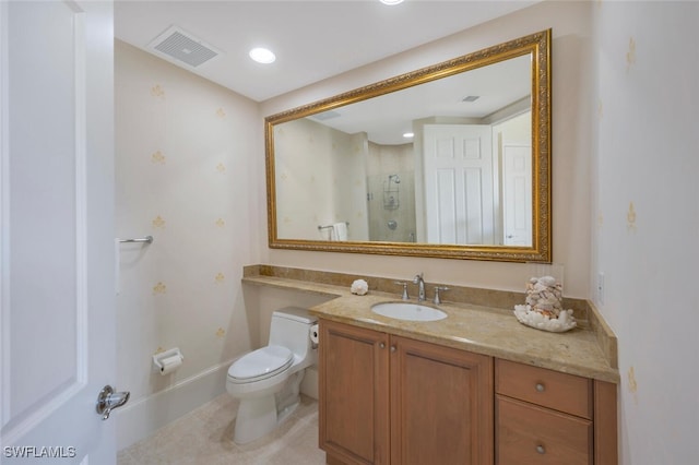 2738 Tiburon Blvd E Unit Ph-B502, Naples, FL 34109 - bathroom with vanity, toilet, a shower with shower door, and baseboards