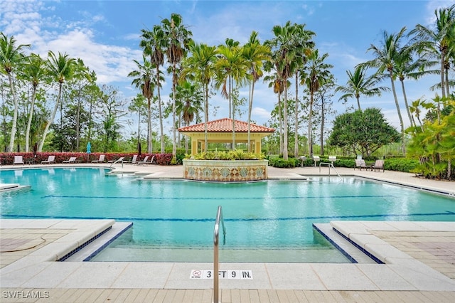 2738 Tiburon Blvd E Unit Ph-B502, Naples, FL 34109 - community pool featuring a gazebo and a patio