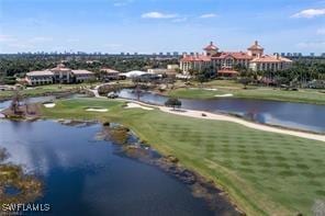 2738 Tiburon Blvd E Unit Ph-B502, Naples, FL 34109 - aerial view of a large body of water and a local golf course