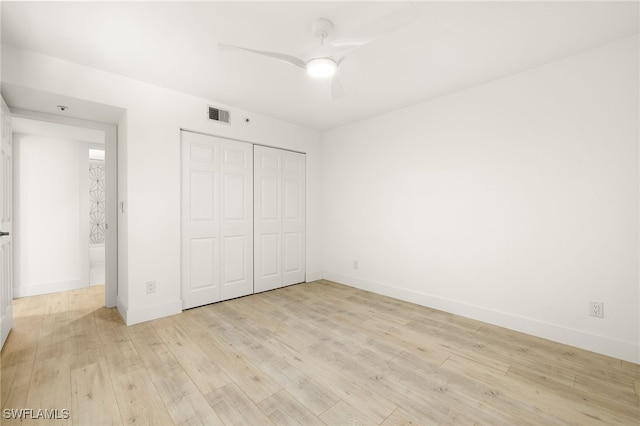 16320 Kelly Cove Dr Unit 270, Fort Myers, FL 33908 - unfurnished bedroom with light wood-type flooring, baseboards, and a closet