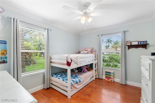 955 Hidden Terrace Rd, Naples, FL 34104 - bedroom with light wood-style flooring, baseboards, ornamental molding, and ceiling fan