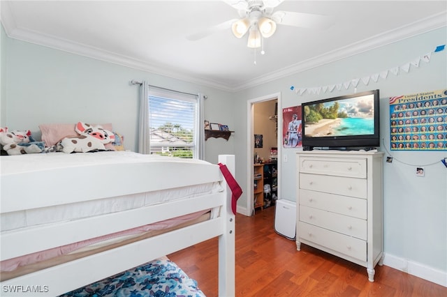 955 Hidden Terrace Rd, Naples, FL 34104 - bedroom featuring crown molding, wood finished floors, a ceiling fan, and baseboards