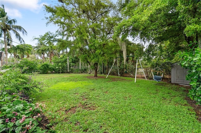 955 Hidden Terrace Rd, Naples, FL 34104 - view of yard with a playground