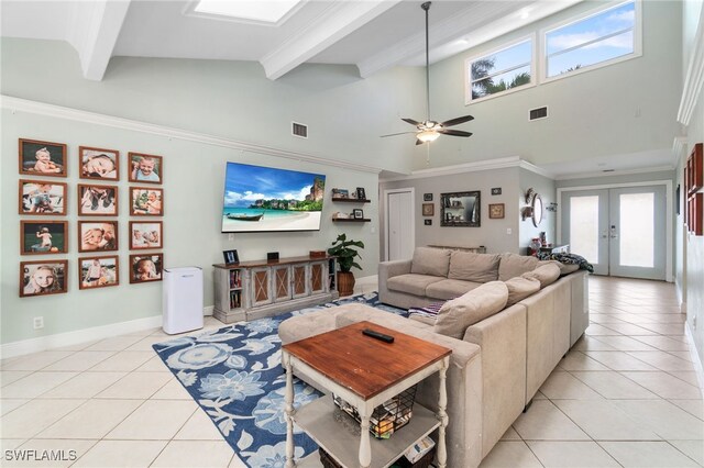 955 Hidden Terrace Rd, Naples, FL 34104 - living room featuring light tile patterned floors, french doors, high vaulted ceiling, beam ceiling, and a ceiling fan