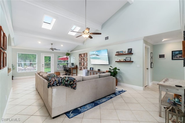 955 Hidden Terrace Rd, Naples, FL 34104 - living room with ceiling fan, a skylight, light tile patterned floors, baseboards, and ornamental molding
