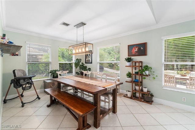 955 Hidden Terrace Rd, Naples, FL 34104 - dining space with crown molding, light tile patterned floors, baseboards, and a chandelier