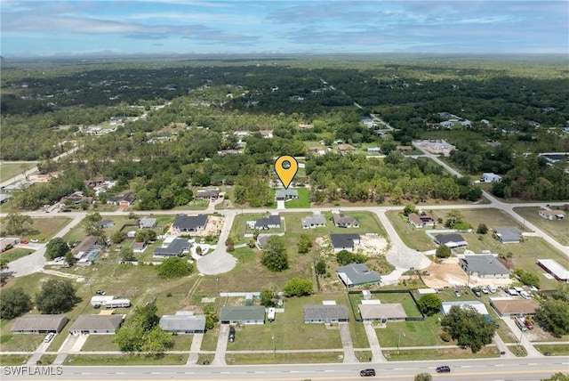 1015 Gerald Ave, Lehigh Acres, FL 33936 - aerial view of property's location with a forest and nearby suburban area