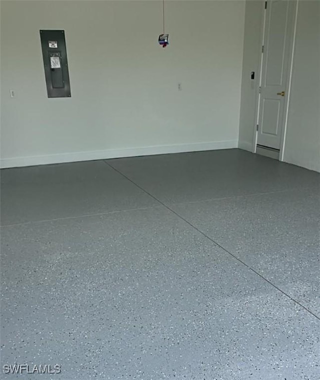 1015 Gerald Ave, Lehigh Acres, FL 33936 - garage featuring electric panel and baseboards