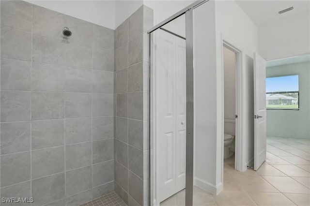 13952 Hunter Oak Dr, Fort Myers, FL 33913 - bathroom featuring a shower stall, toilet, and tile patterned flooring