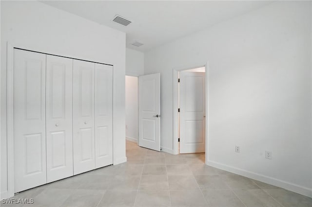 13952 Hunter Oak Dr, Fort Myers, FL 33913 - unfurnished bedroom with baseboards and a closet
