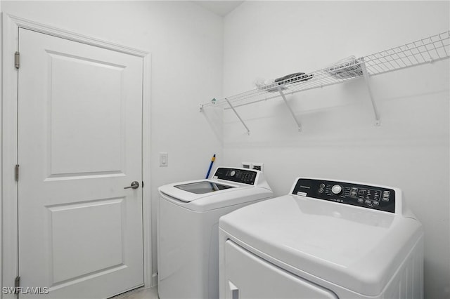 13952 Hunter Oak Dr, Fort Myers, FL 33913 - laundry area featuring separate washer and dryer