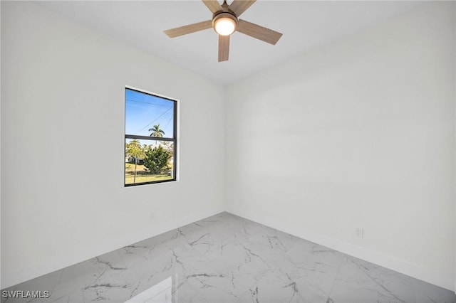 3034 Chiquita Blvd N, Cape Coral, FL 33993 - unfurnished room with marble finish flooring, baseboards, and ceiling fan
