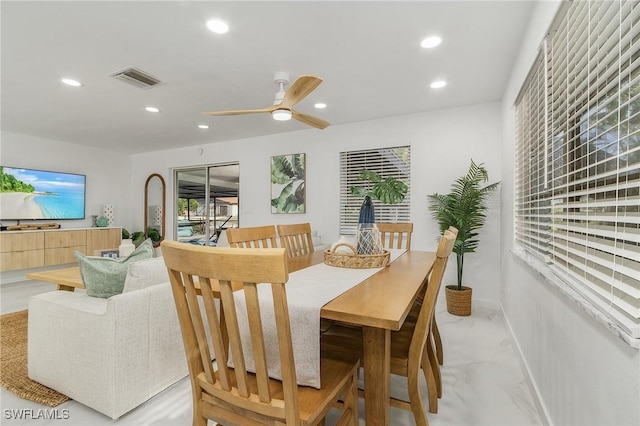 5127 SW 3rd Ave, Cape Coral, FL 33914 - dining space with recessed lighting, a ceiling fan, baseboards, and light marble finish floors