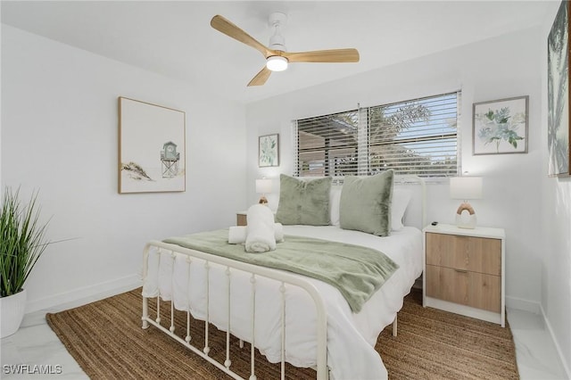 5127 SW 3rd Ave, Cape Coral, FL 33914 - bedroom with baseboards and ceiling fan