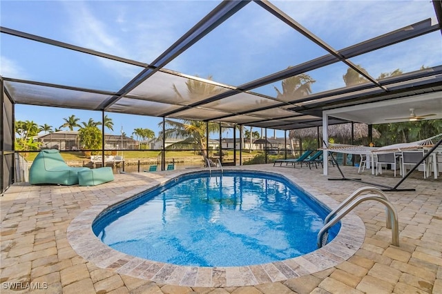 5127 SW 3rd Ave, Cape Coral, FL 33914 - swimming pool featuring a patio area and glass enclosure