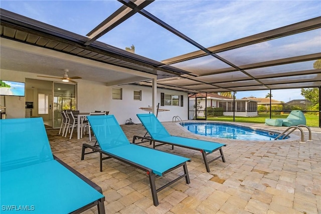 5127 SW 3rd Ave, Cape Coral, FL 33914 - swimming pool featuring a patio area, ceiling fan, a lanai, and outdoor dining space