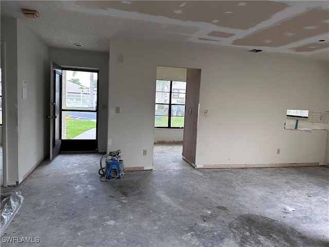 632 SE 12th Ct Unit 12, Cape Coral, FL 33990 - spare room with concrete floors