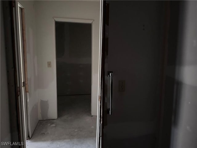 632 SE 12th Ct Unit 12, Cape Coral, FL 33990 - corridor featuring unfinished concrete floors