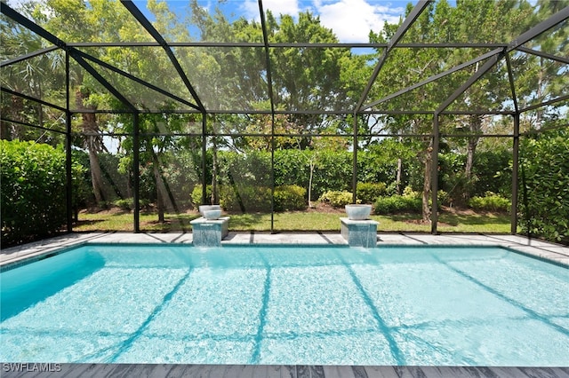 4654 Kensington Cir, Naples, FL 34119 - outdoor pool with a lanai