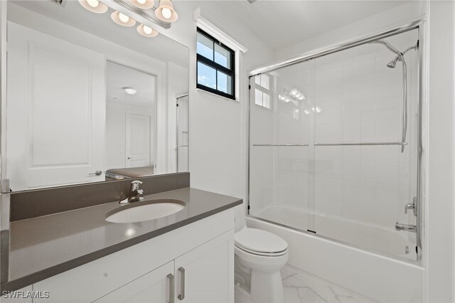 4654 Kensington Cir, Naples, FL 34119 - full bathroom with vanity, marble look tile flooring, toilet, and enclosed tub / shower combo
