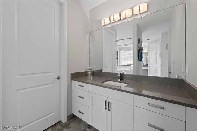 4654 Kensington Cir, Naples, FL 34119 - bathroom featuring vanity