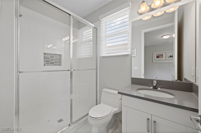 4654 Kensington Cir, Naples, FL 34119 - full bathroom featuring vanity, toilet, a stall shower, and a chandelier
