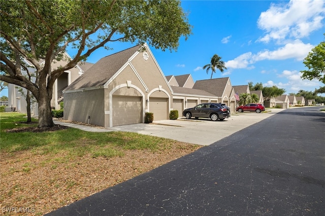 16290 Kelly Cove Dr Unit 253, Fort Myers, FL 33908 - view of front of house with stucco siding, a front yard, and a residential view