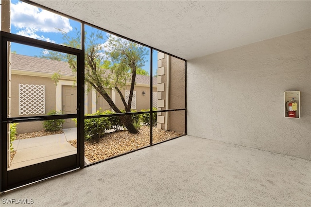 16290 Kelly Cove Dr Unit 253, Fort Myers, FL 33908 - unfurnished sunroom featuring healthy amount of natural light