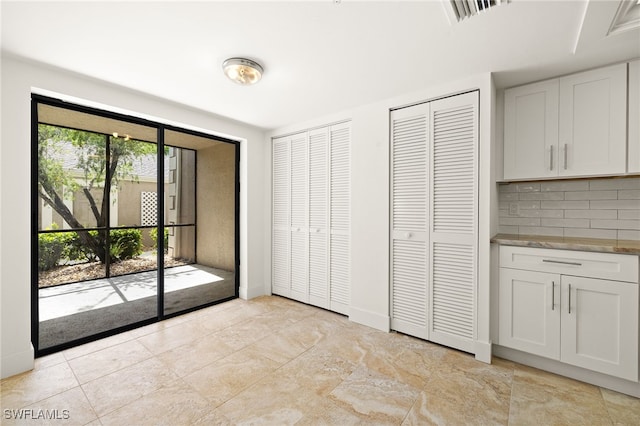 16290 Kelly Cove Dr Unit 253, Fort Myers, FL 33908 - unfurnished dining area with baseboards