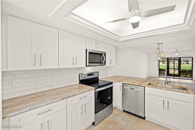 16290 Kelly Cove Dr Unit 253, Fort Myers, FL 33908 - kitchen featuring stainless steel appliances, a sink, ceiling fan, and white cabinets