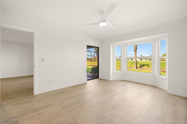 16290 Kelly Cove Dr Unit 253, Fort Myers, FL 33908 - empty room featuring light wood-style floors and ceiling fan