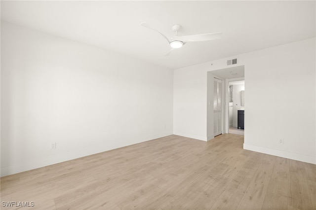 16290 Kelly Cove Dr Unit 253, Fort Myers, FL 33908 - unfurnished room with light wood-style flooring, ceiling fan, and baseboards