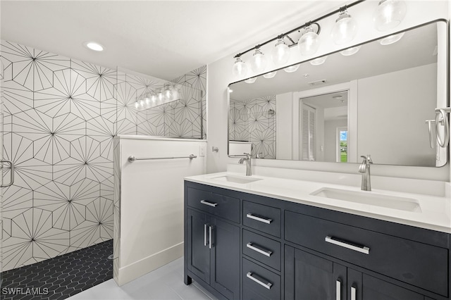 16290 Kelly Cove Dr Unit 253, Fort Myers, FL 33908 - bathroom featuring double vanity, tiled shower, tile patterned flooring, and recessed lighting